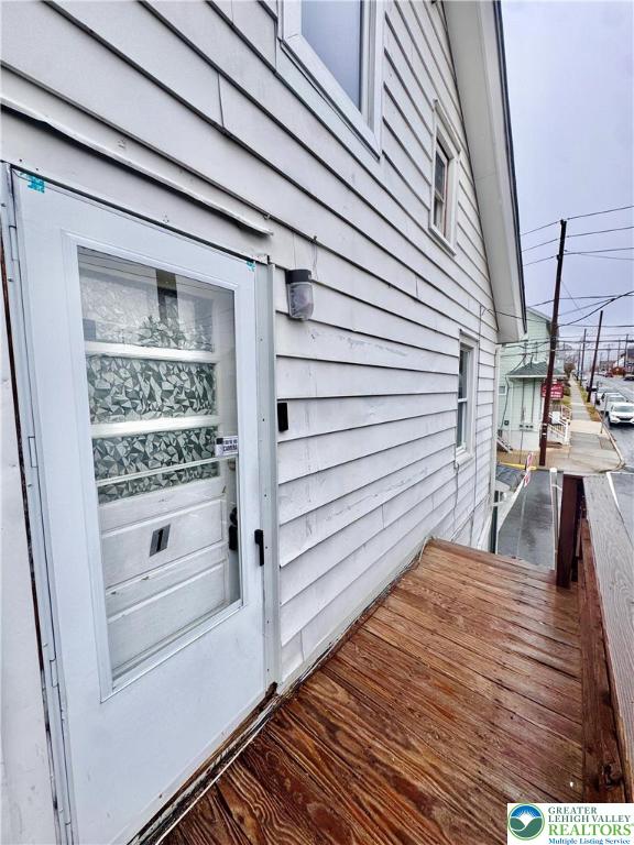 1102 2nd Street, Unit 1 Catasauqua, PA 18032 - Photo 2 of 13 a view of a balcony with wooden floor