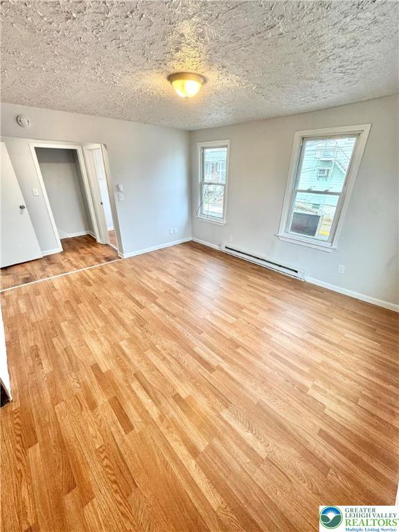 1102 2nd Street, Unit 1 Catasauqua, PA 18032 - Photo 5 of 13 a view of empty room with window and wooden floor
