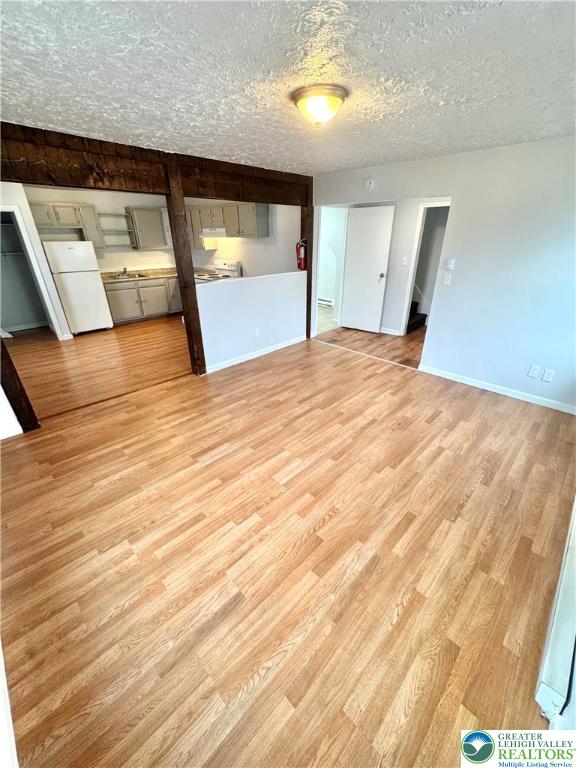 1102 2nd Street, Unit 1 Catasauqua, PA 18032 - Photo 6 of 13 a view of empty room with wooden floor