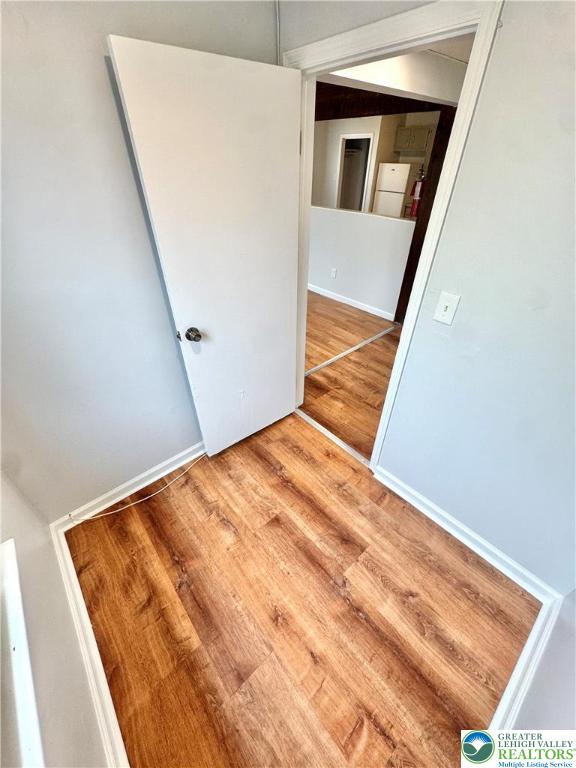 1102 2nd Street, Unit 1 Catasauqua, PA 18032 - Photo 9 of 13 a view of a big room with wooden floor and stairs