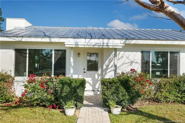 a front view of a house with a porch