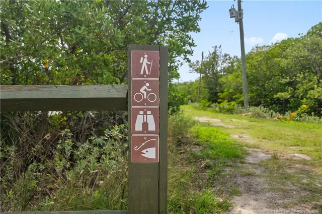 a view of a street with a ocean view
