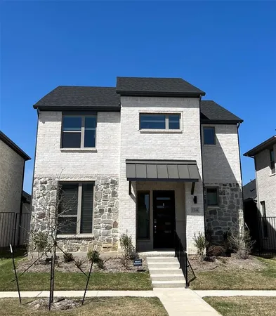 a front view of a house with yard