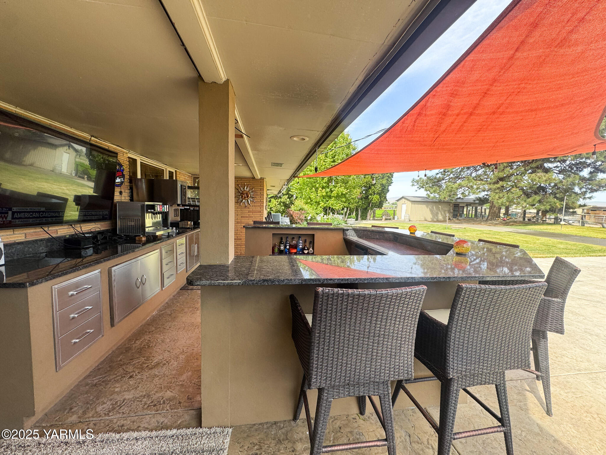 1450 Scoon Road Sunnyside, WA 98944 - Photo 22 of 33 a kitchen with a table and chairs in it