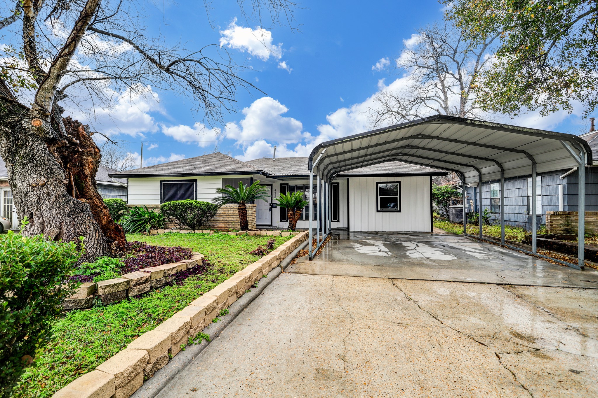 a view of house with outdoor space and porch area