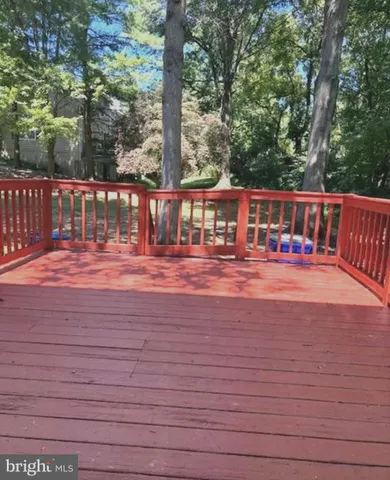 a view of a house with a chairs in patio