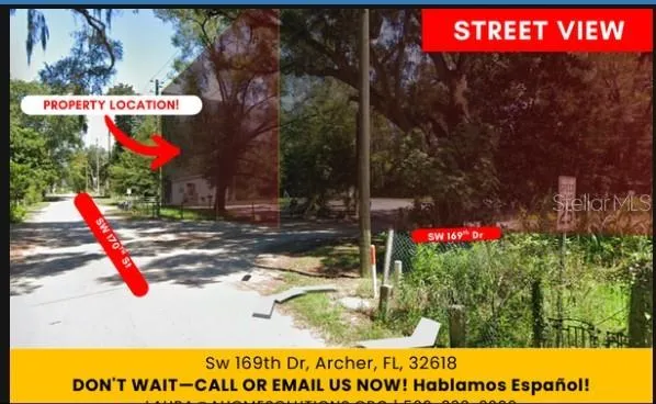 a street sign is next to a road