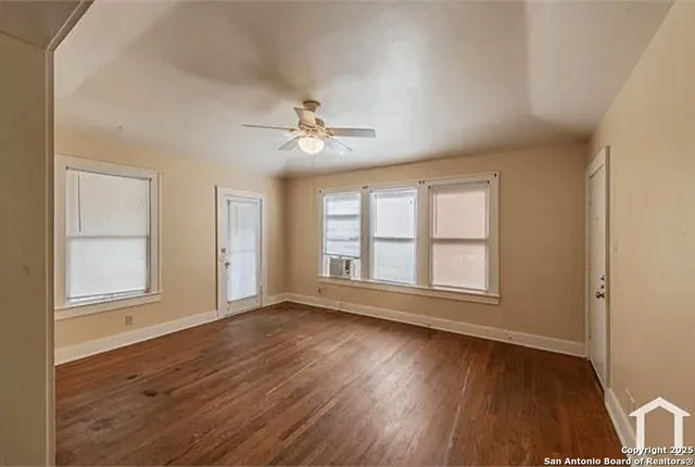 a view of balcony with wooden floor