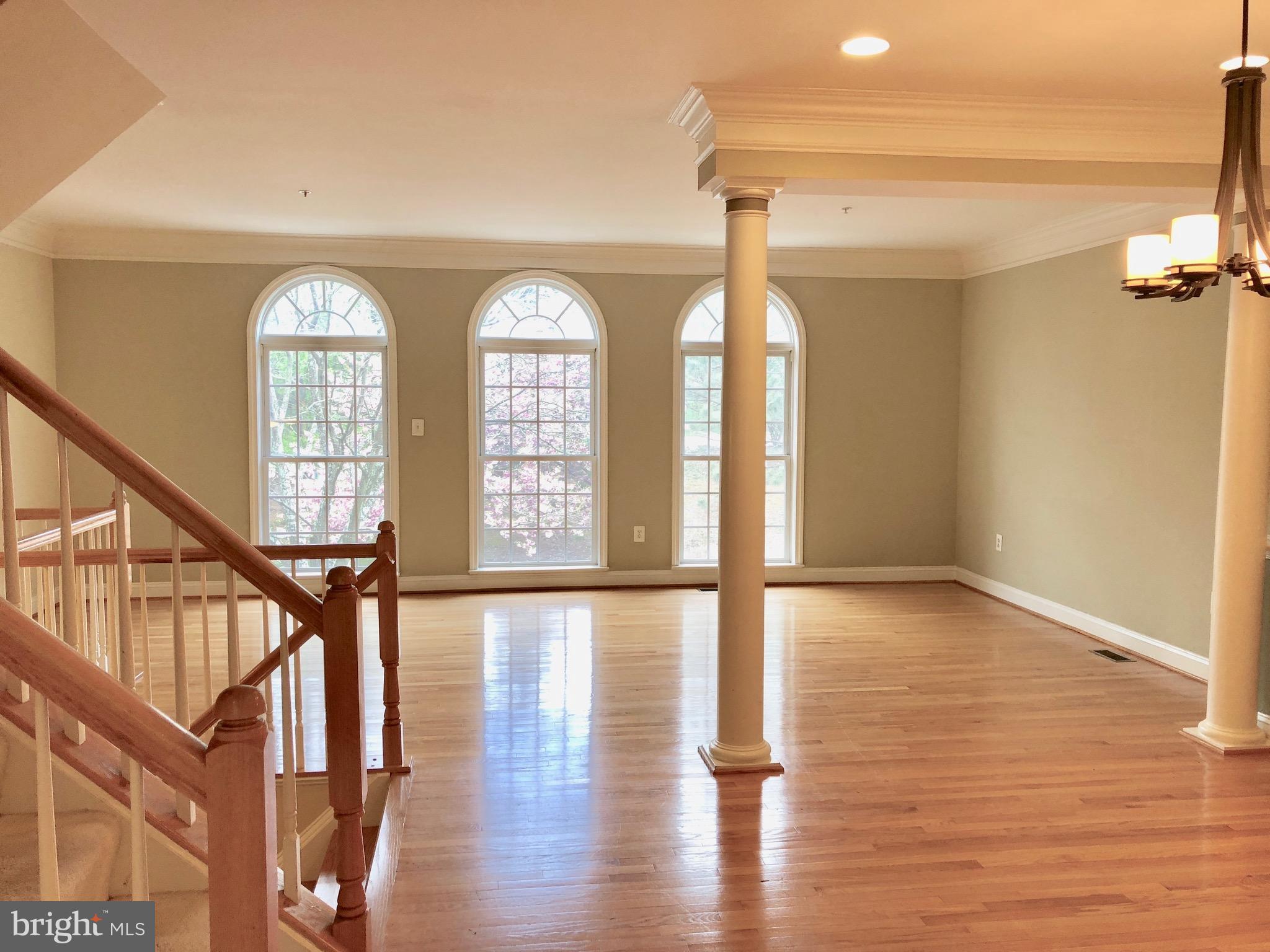 6402 Spring View Place Rockville, MD 20852 - Photo 2 of 25 a view of an entryway with wooden floor