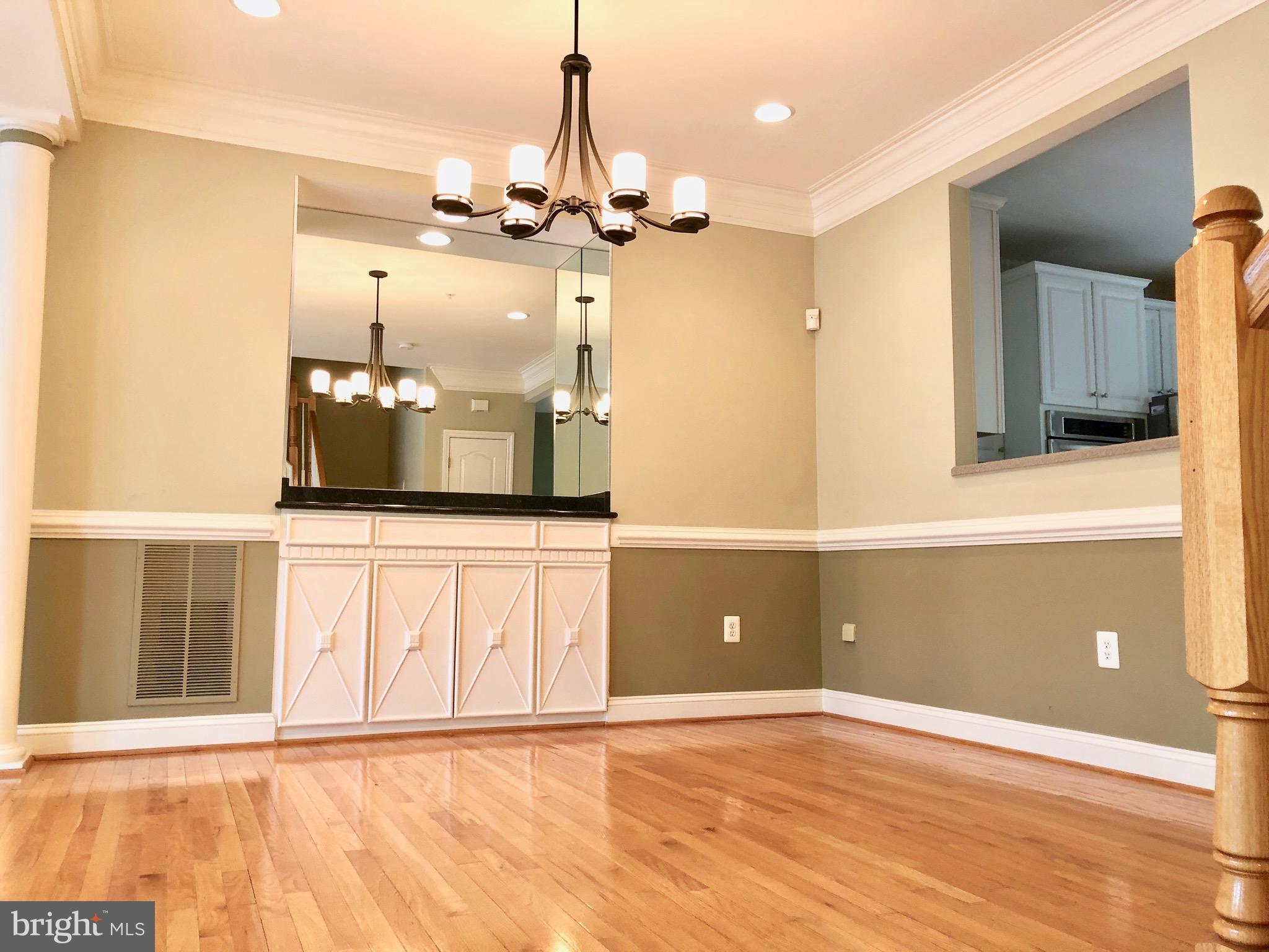 6402 Spring View Place Rockville, MD 20852 - Photo 4 of 25 a view of a kitchen with a sink and a window