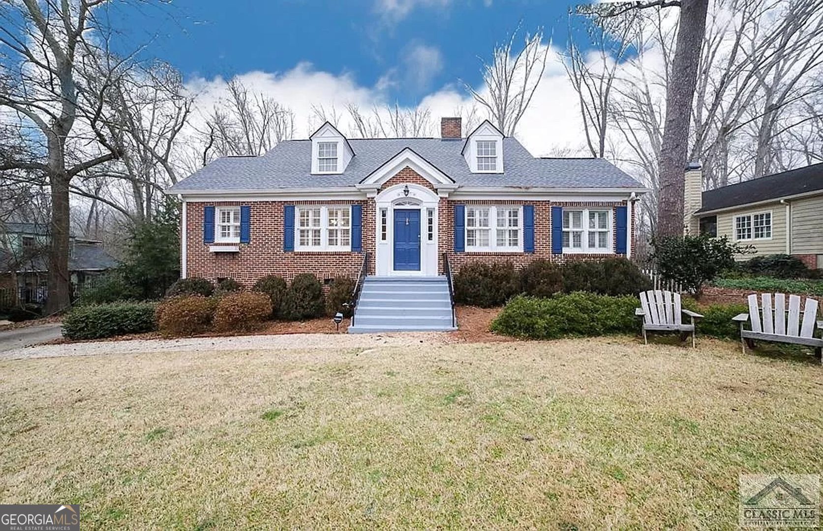 482 Highland Avenue Athens, GA 30606 - Photo 1 of 24 a front view of a house with garden and trees