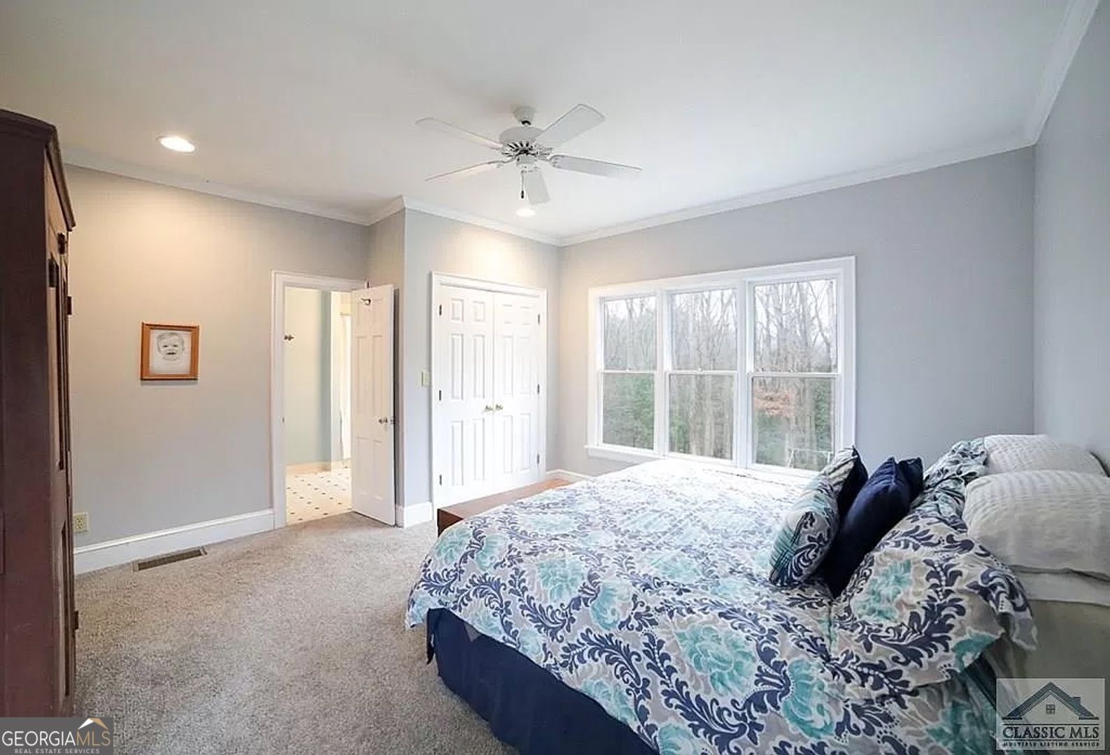 482 Highland Avenue Athens, GA 30606 - Photo 16 of 24 a bedroom with a large bed and a window