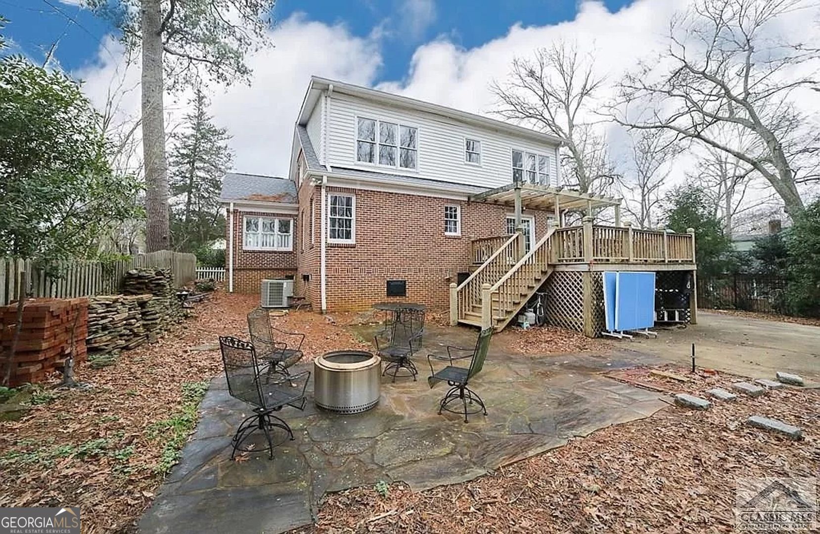 482 Highland Avenue Athens, GA 30606 - Photo 23 of 24 a view of a chair and table in the backyard