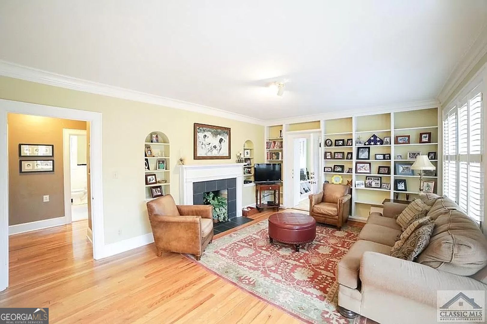 482 Highland Avenue Athens, GA 30606 - Photo 7 of 24 a living room with furniture and a fireplace