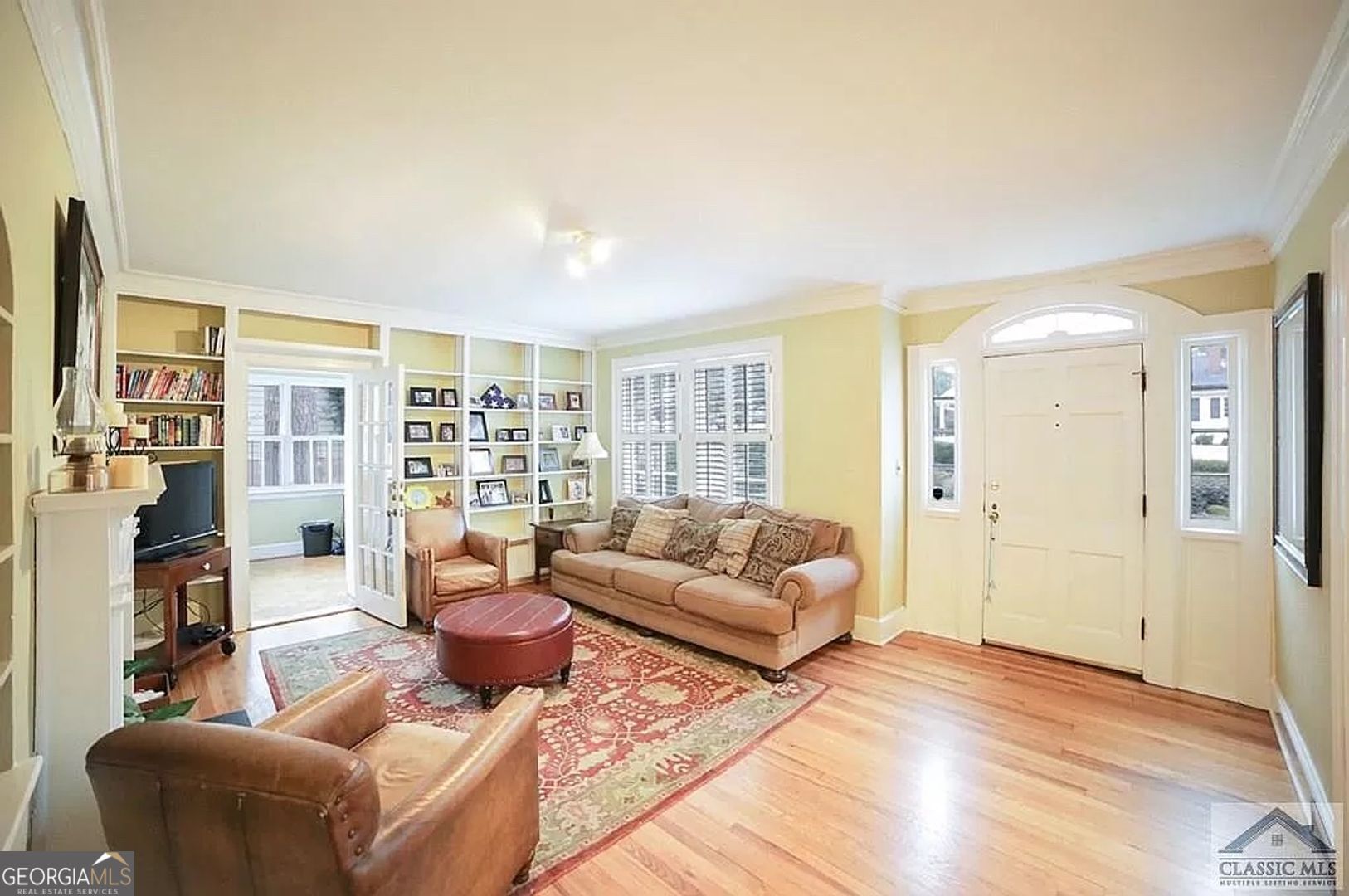 482 Highland Avenue Athens, GA 30606 - Photo 8 of 24 a living room with furniture and a wooden floor