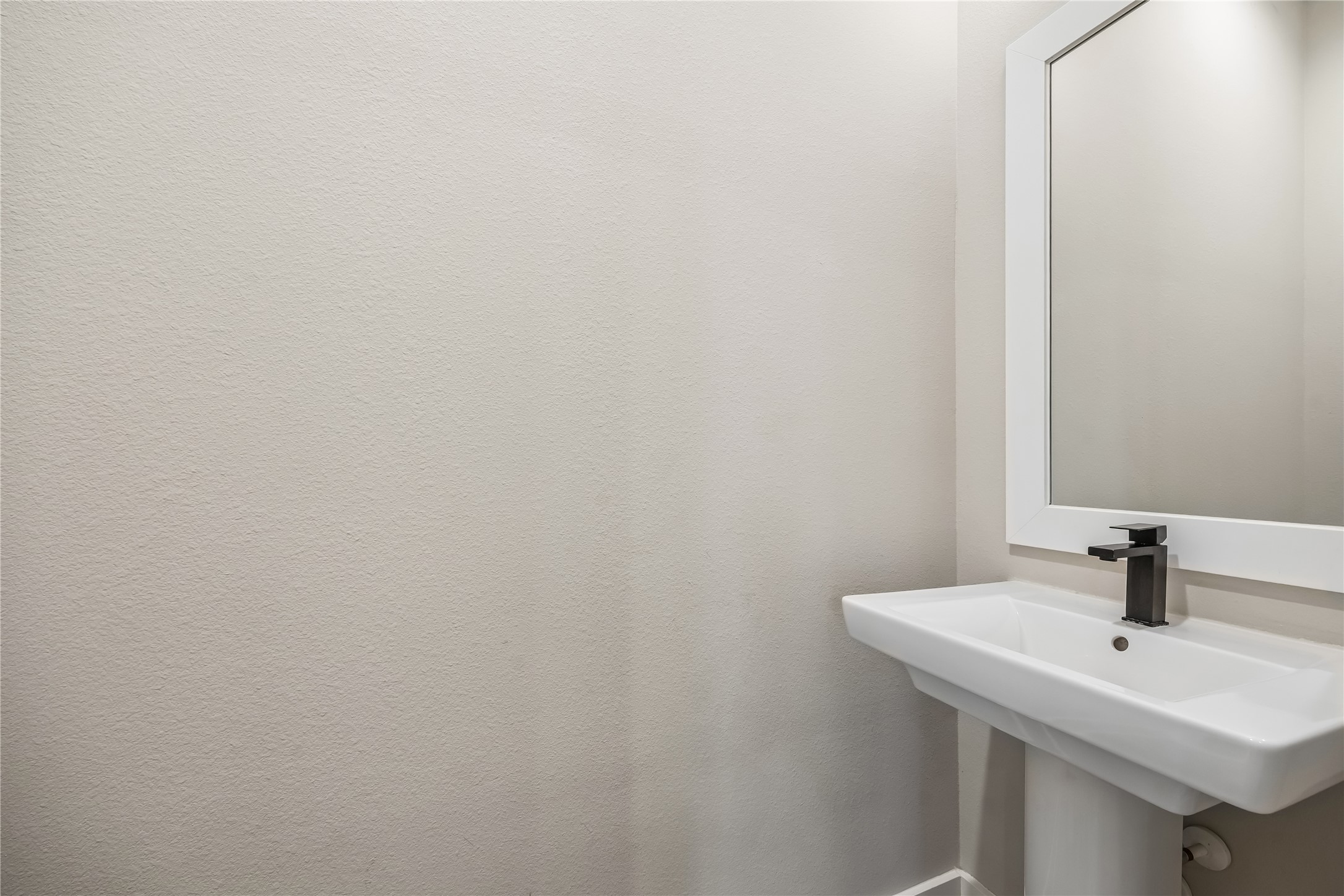 1209 West Tidwell Road Houston, TX 77091 - Photo 13 of 25 The very useful half bath on the first floor.