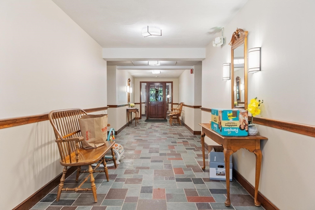 420 Great Road, Unit C1 Acton, MA 01720 - Photo 27 of 29 a view of a hallway with seating area