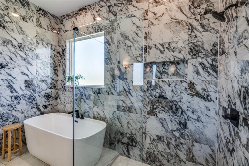 1956 Jc Maples Road Gunter, TX 75058 - Photo 20 of 38 a bathroom with a bathtub and shower