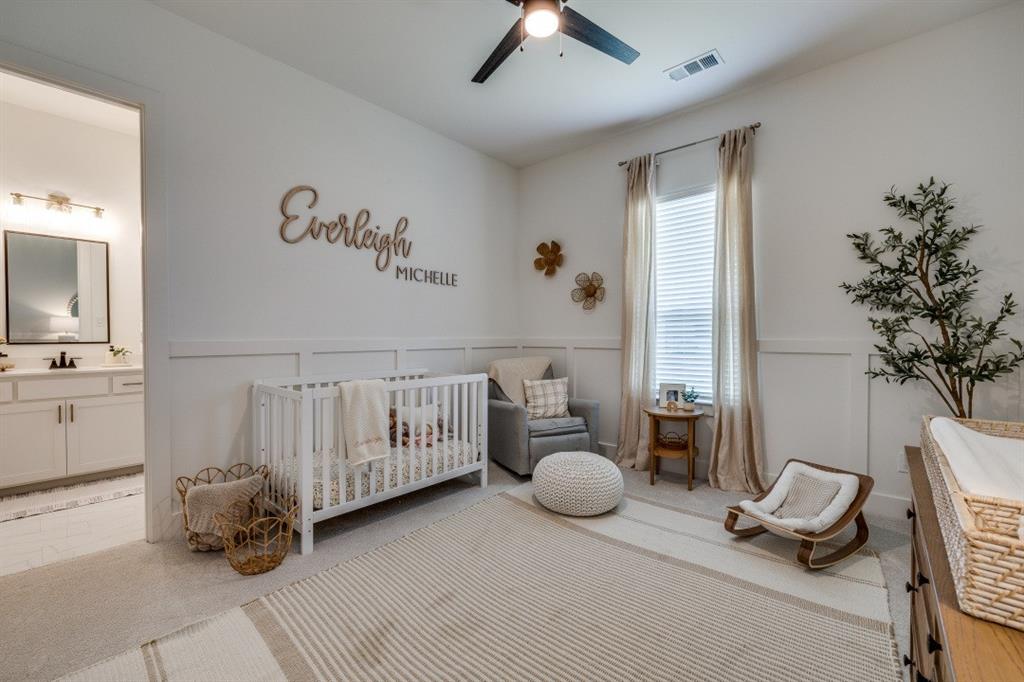 1956 Jc Maples Road Gunter, TX 75058 - Photo 25 of 38 a bedroom with furniture and a potted plant