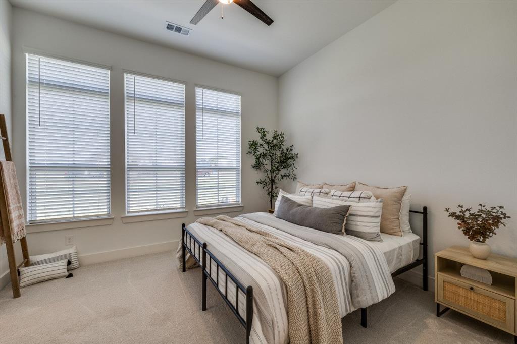 1956 Jc Maples Road Gunter, TX 75058 - Photo 26 of 38 a bedroom with a bed and a window