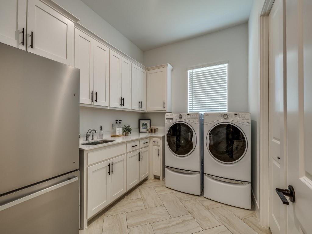 1956 Jc Maples Road Gunter, TX 75058 - Photo 28 of 38 a utility room with sink dryer and washer
