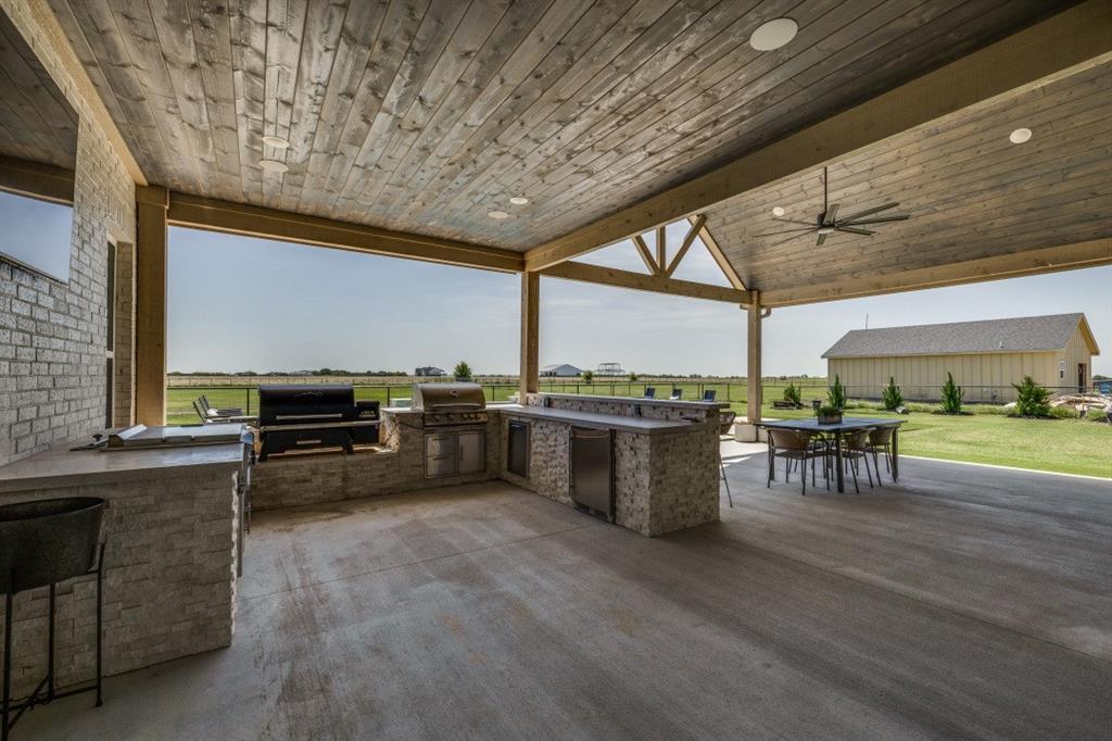 1956 Jc Maples Road Gunter, TX 75058 - Photo 33 of 38 a view of a kitchen with furniture and a kitchen