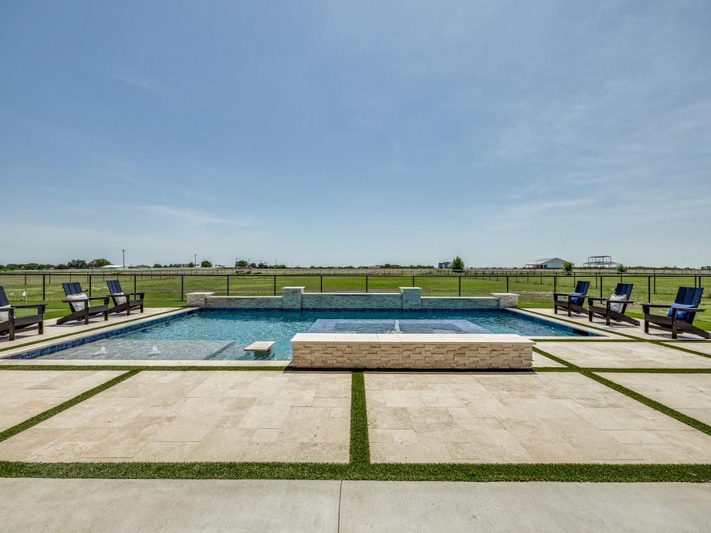 1956 Jc Maples Road Gunter, TX 75058 - Photo 35 of 38 a view of swimming pool with seating area and