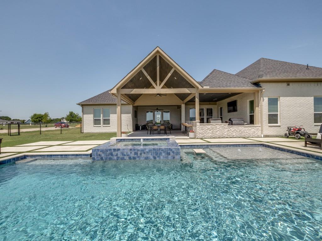 1956 Jc Maples Road Gunter, TX 75058 - Photo 36 of 38 a house view with swimming pool and view of a house