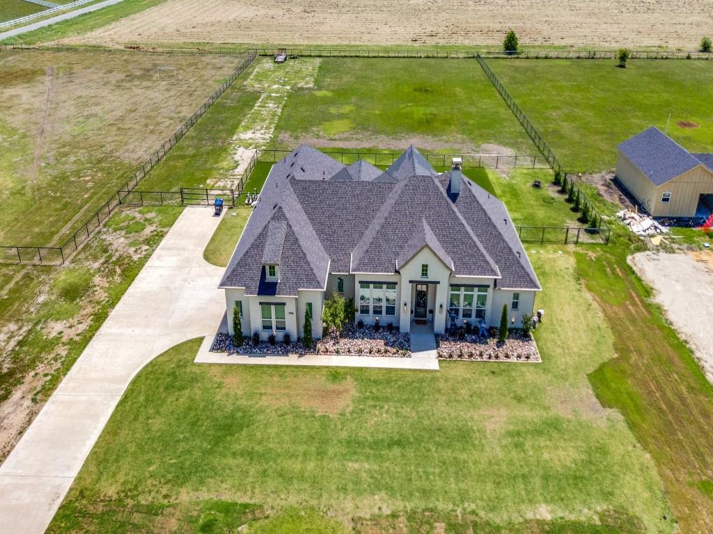 1956 Jc Maples Road Gunter, TX 75058 - Photo 4 of 38 a aerial view of a house with a garden and lake view
