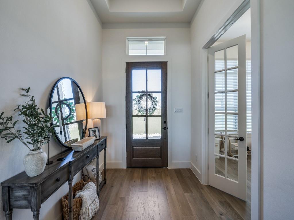 1956 Jc Maples Road Gunter, TX 75058 - Photo 6 of 38 a view of a livingroom with furniture and hardwood floor