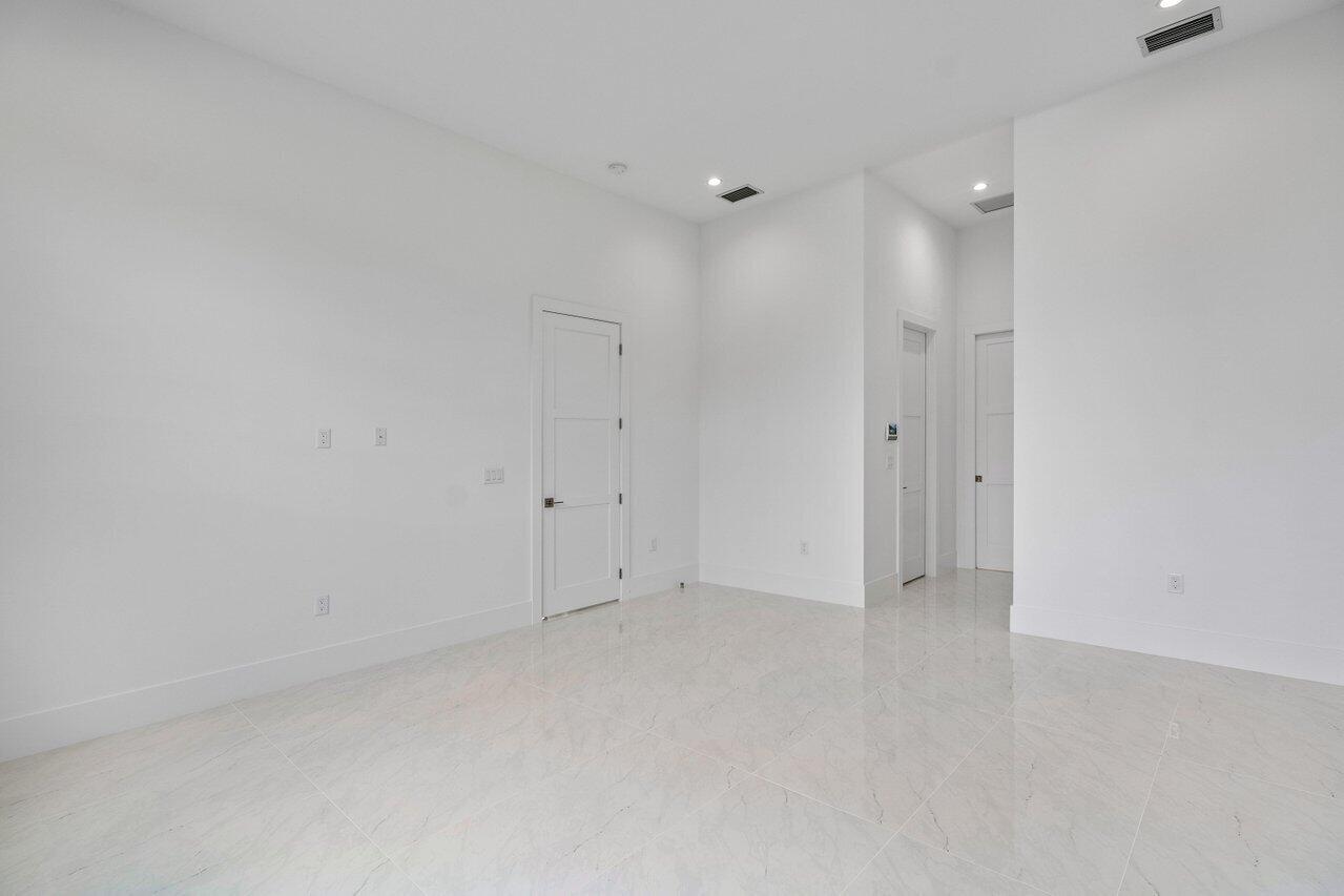 691 Kingsbridge Street Boca Raton, FL 33487 - Photo 14 of 44 Main Bedroom reverse