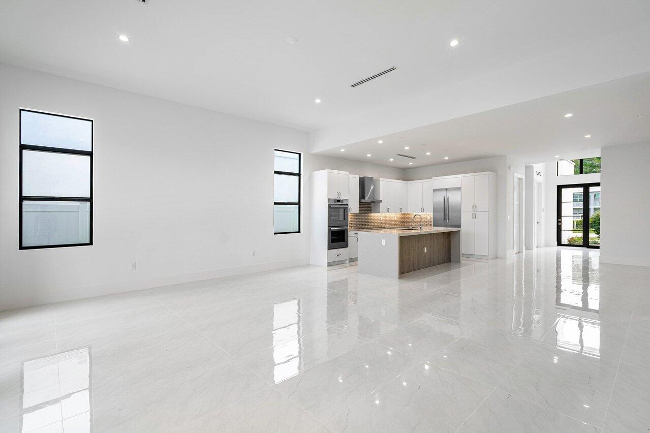 691 Kingsbridge Street Boca Raton, FL 33487 - Photo 5 of 44 Great room to kitchen