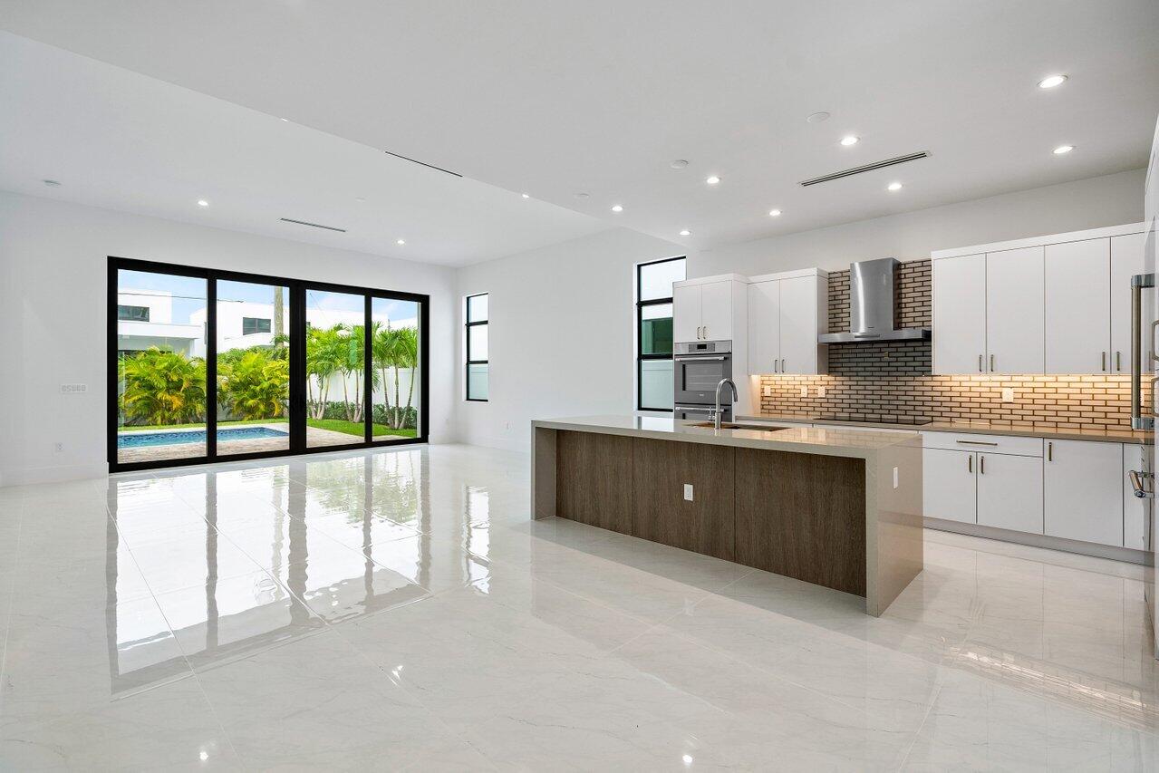 691 Kingsbridge Street Boca Raton, FL 33487 - Photo 7 of 44 Great room to kitchen