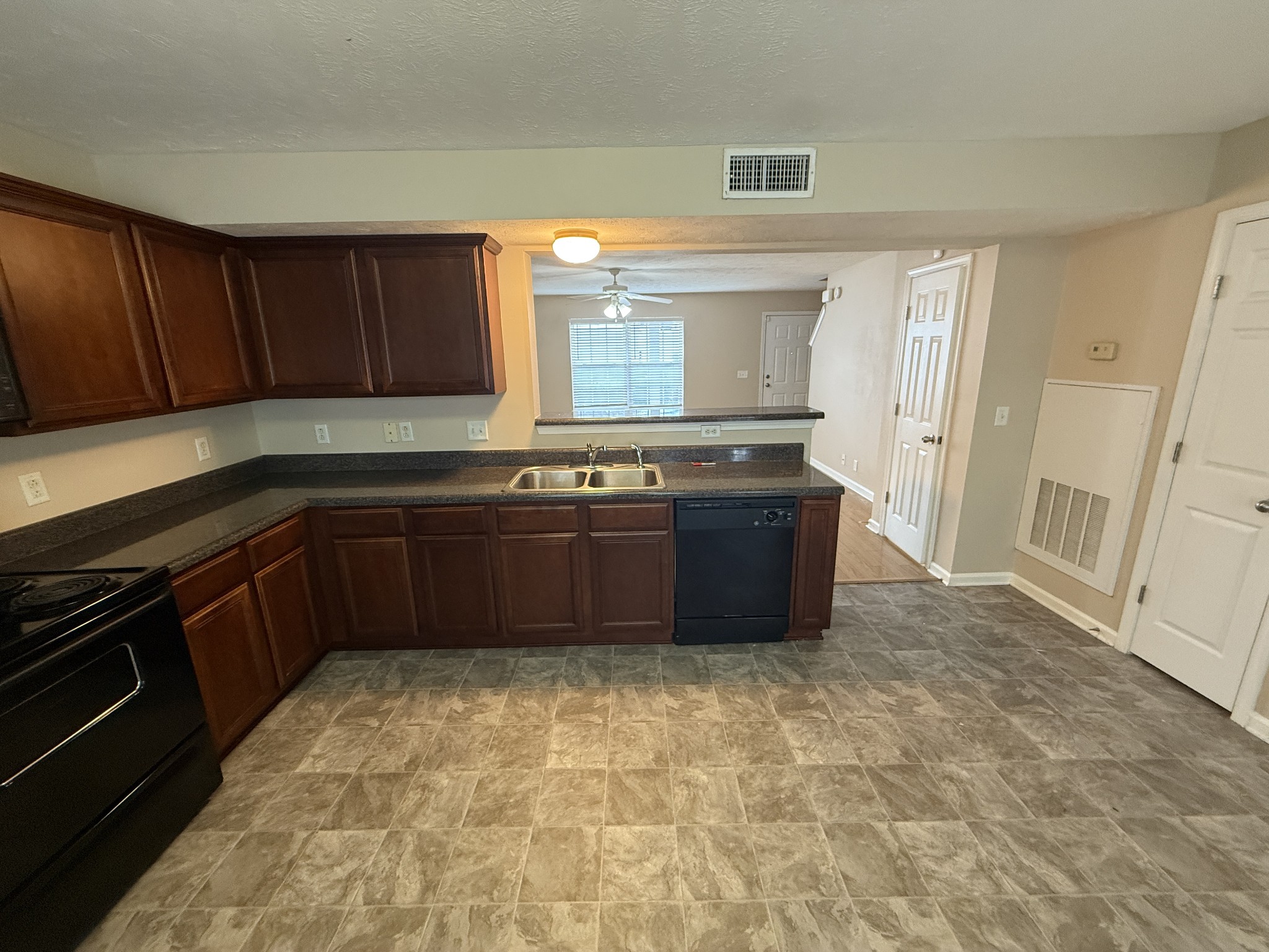 3055 London View Murfreesboro, TN 37128 - Photo 5 of 12 a kitchen with a sink and cabinets