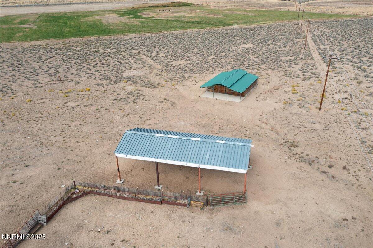 4055 Bacon Rind Road Reno, NV 89510 - Photo 6 of 15 a wooden bench sitting in the middle of a yard