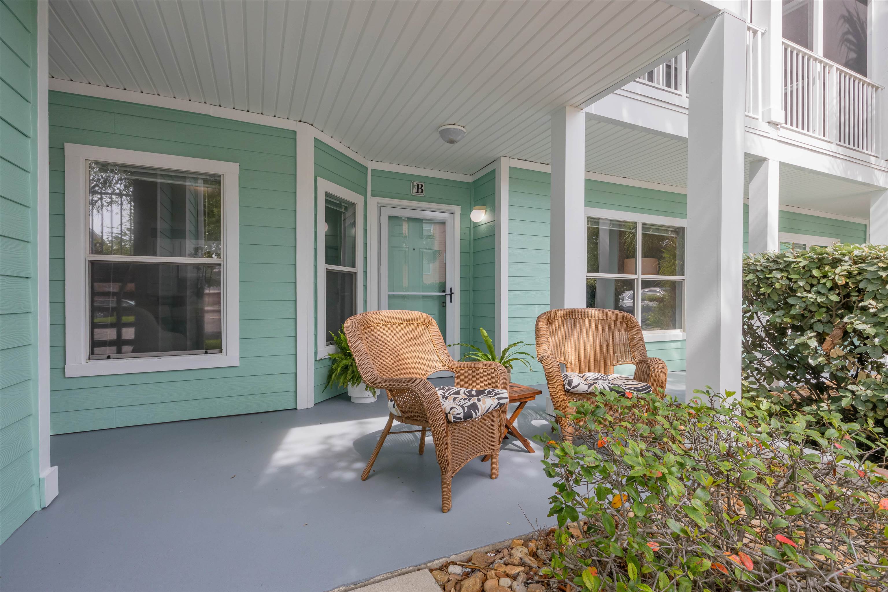 208 16th Street, Unit B St. Augustine, FL 32080 - Photo 2 of 68 a view of two chairs in patio of the house
