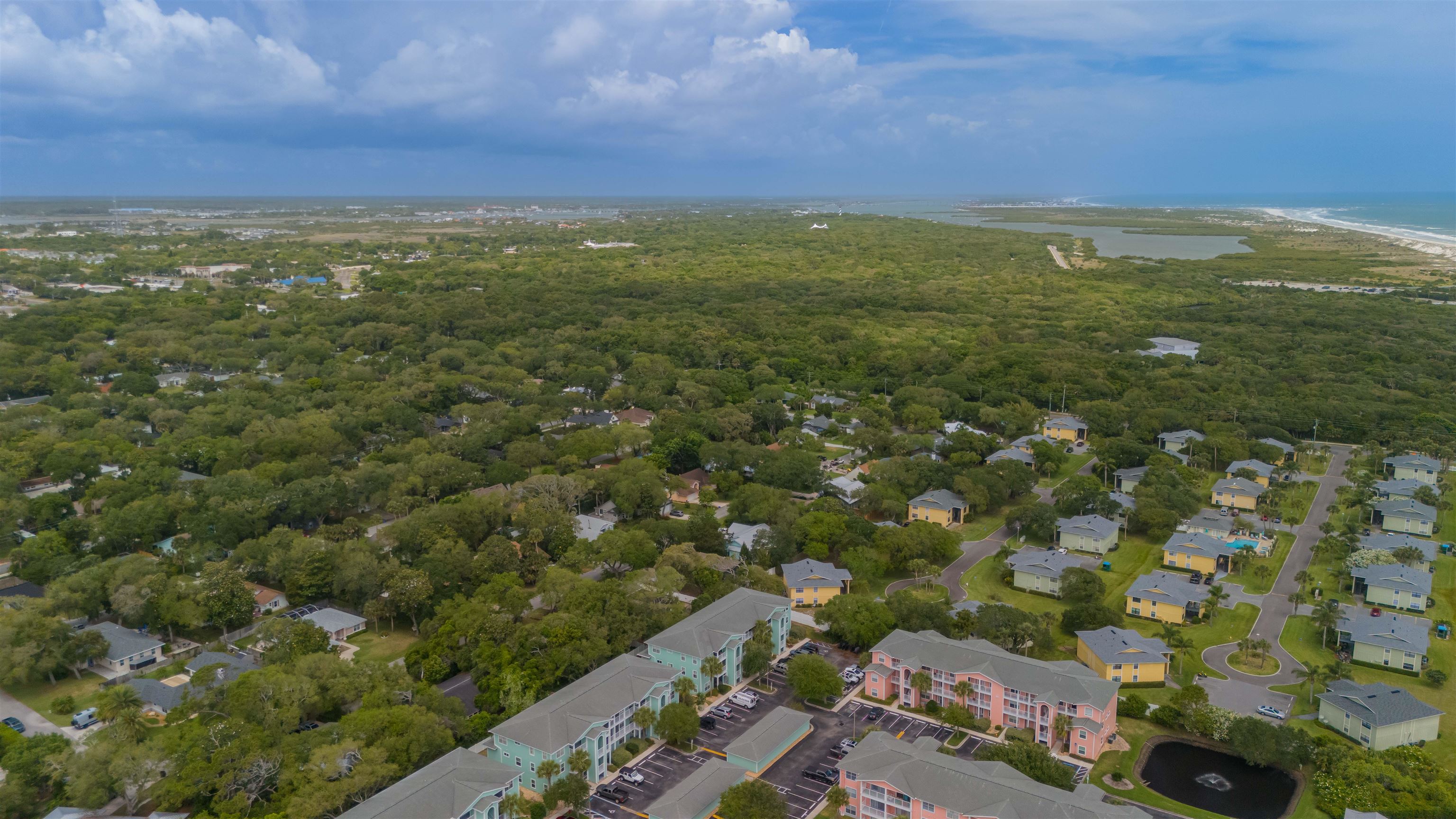 208 16th Street, Unit B St. Augustine, FL 32080 - Photo 44 of 68 an aerial view of residential houses with outdoor space and trees