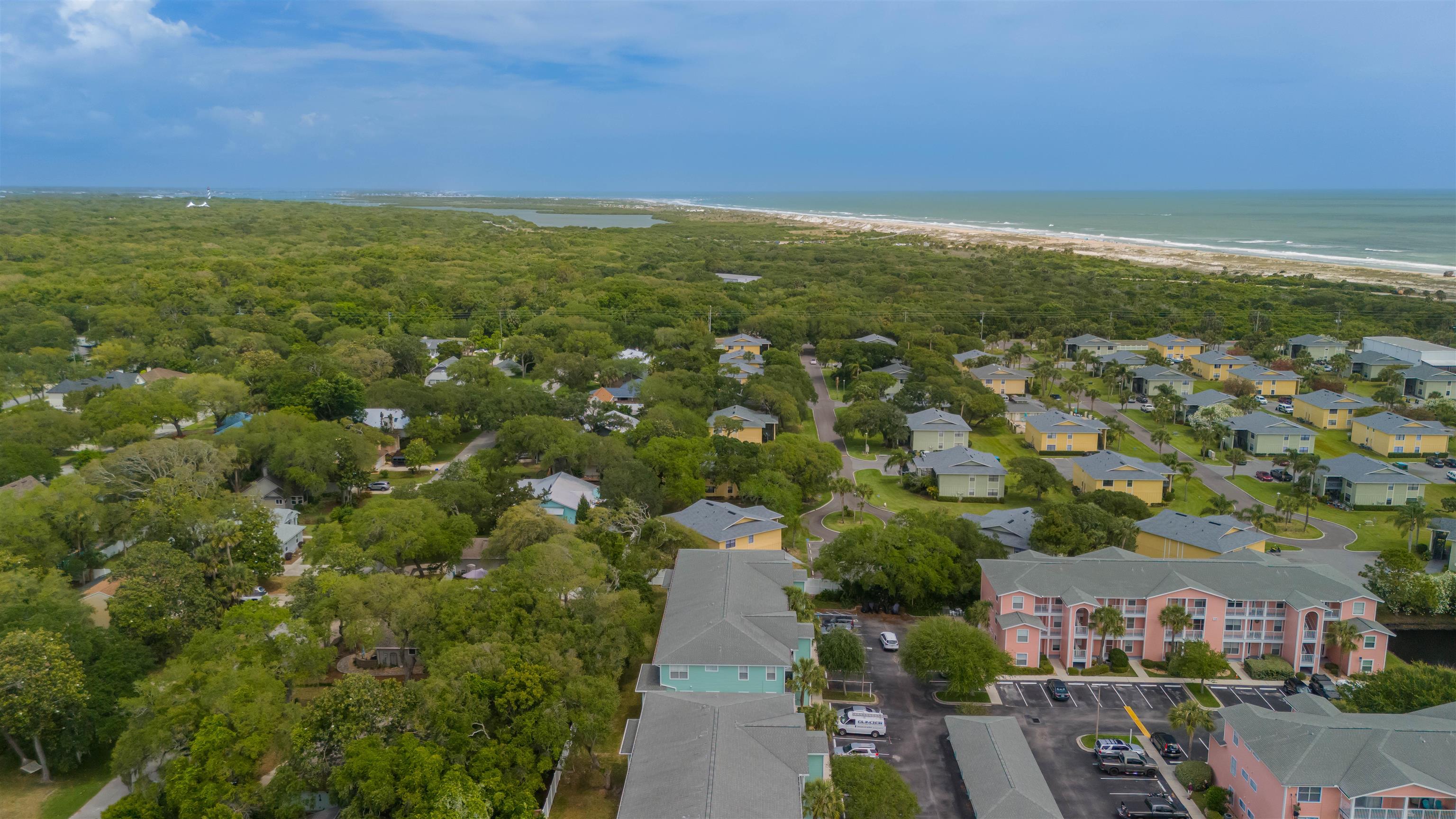 208 16th Street, Unit B St. Augustine, FL 32080 - Photo 48 of 68 an aerial view of residential houses with outdoor space and trees
