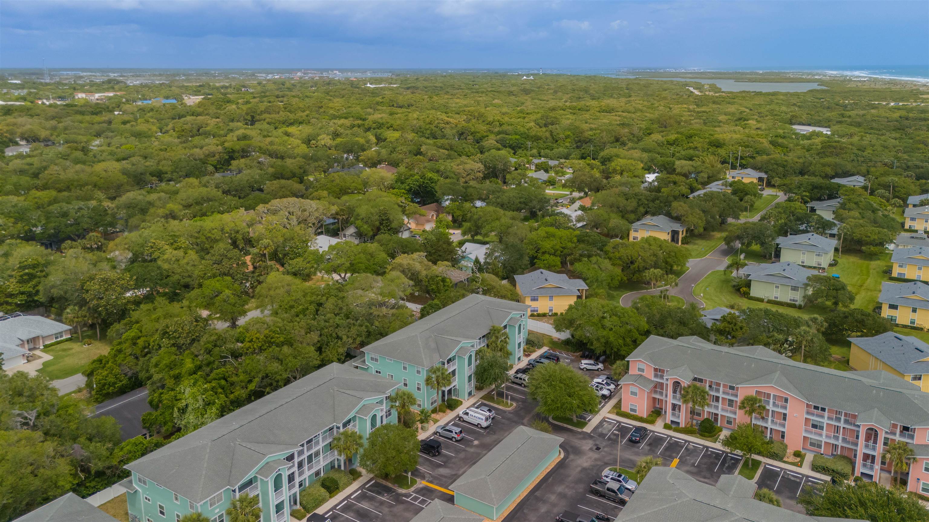 208 16th Street, Unit B St. Augustine, FL 32080 - Photo 49 of 68 an aerial view of residential houses with outdoor space and trees