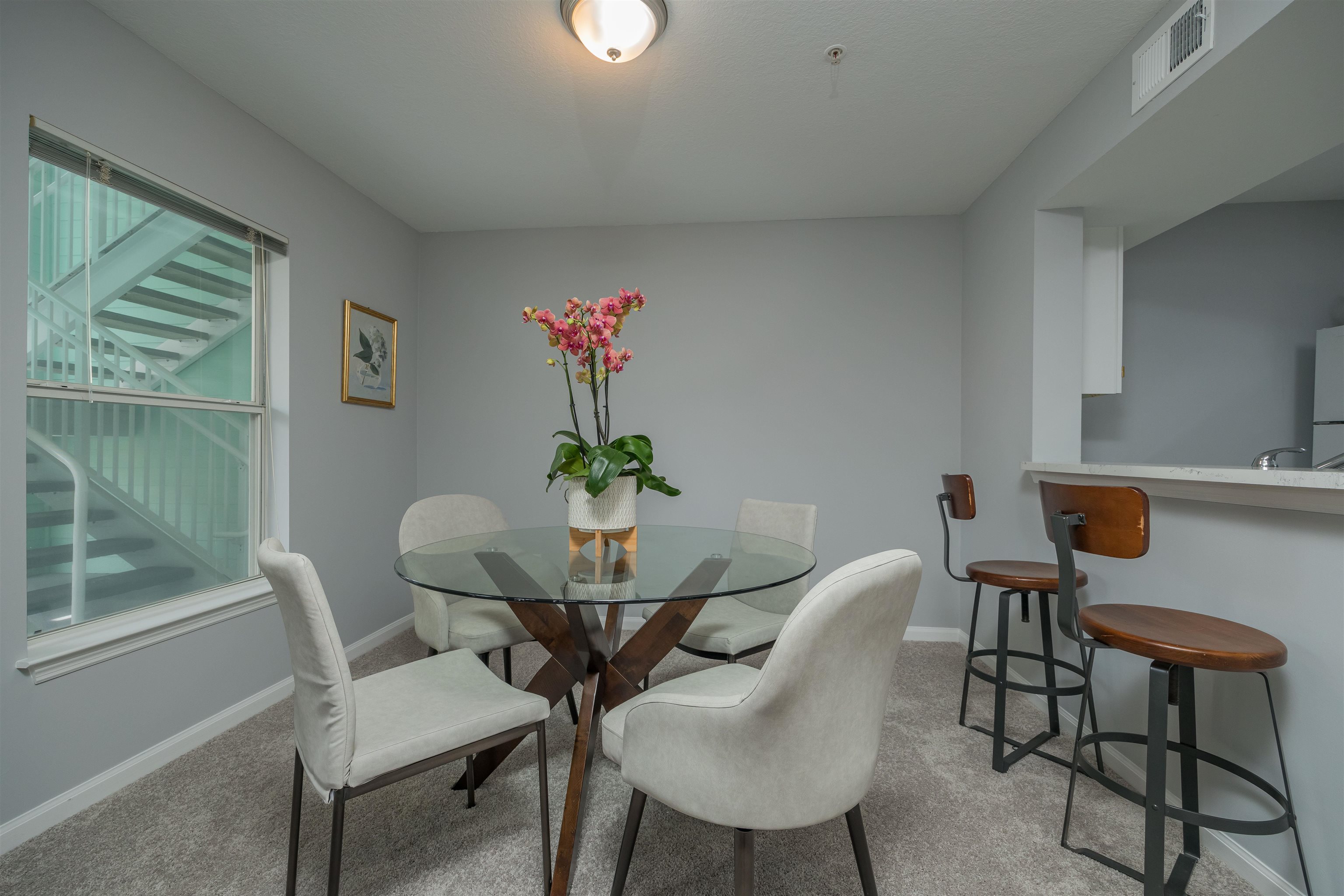 208 16th Street, Unit B St. Augustine, FL 32080 - Photo 9 of 68 a view of a dining room with furniture and wooden floor