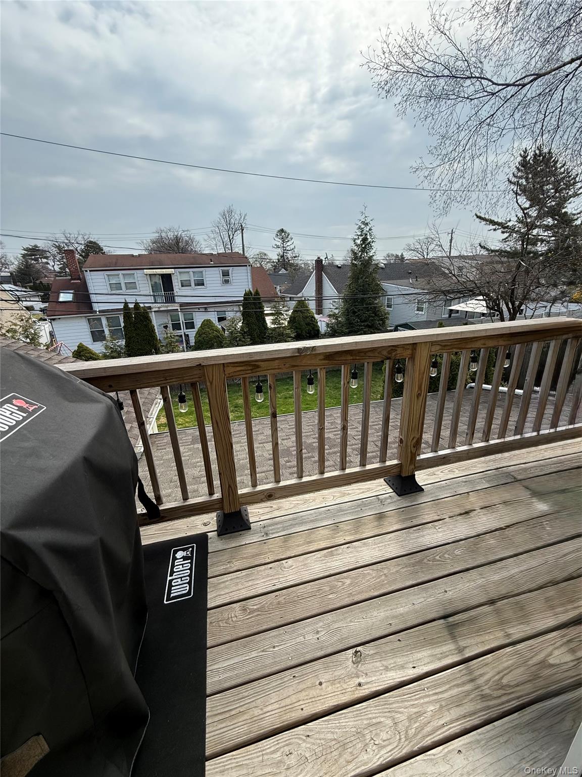 1009 Huckleberry Road North Bellmore, NY 11710 - Photo 21 of 24 a view of wooden balcony with furniture