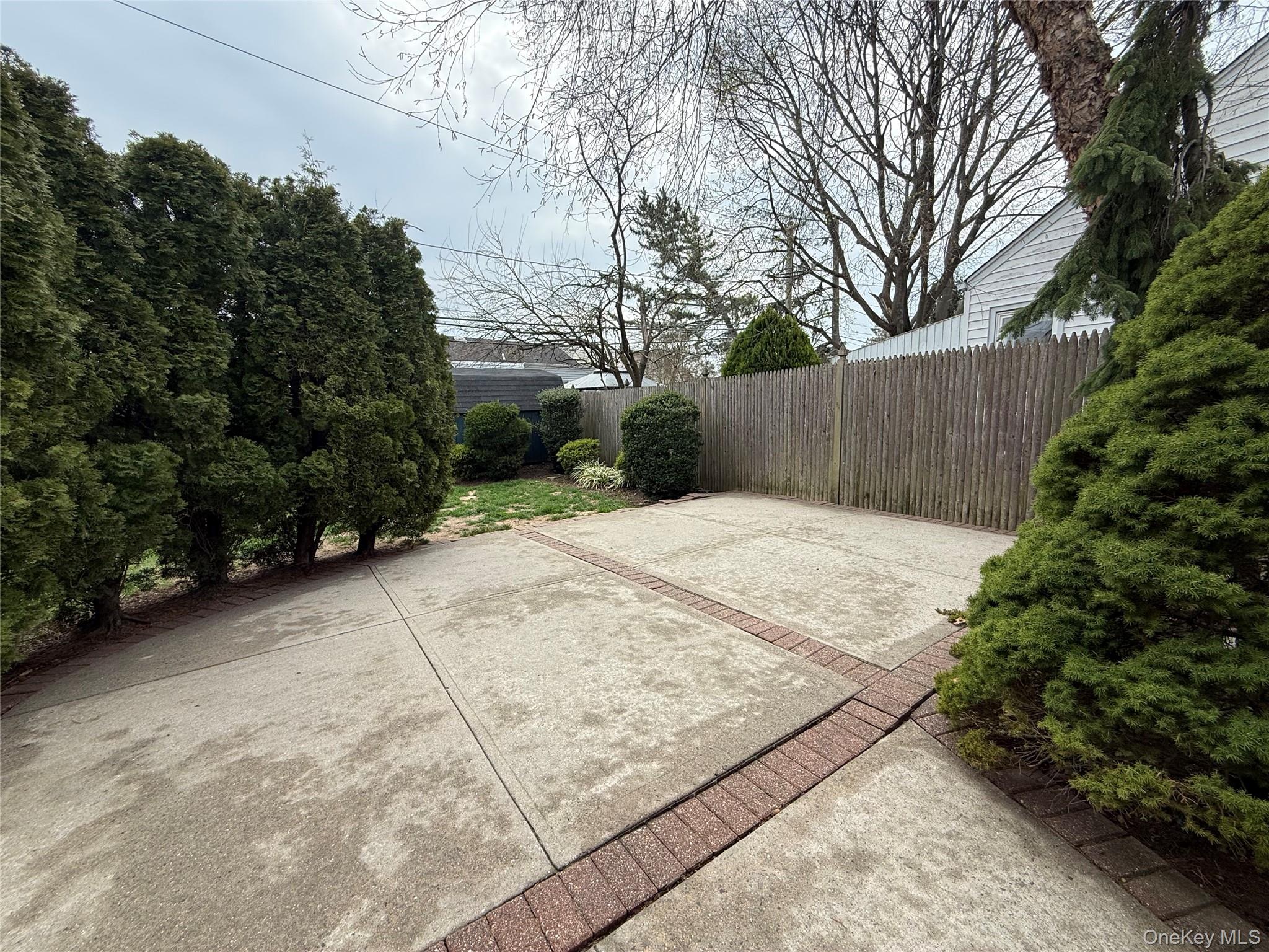 1009 Huckleberry Road North Bellmore, NY 11710 - Photo 24 of 24 a view of backyard with green space