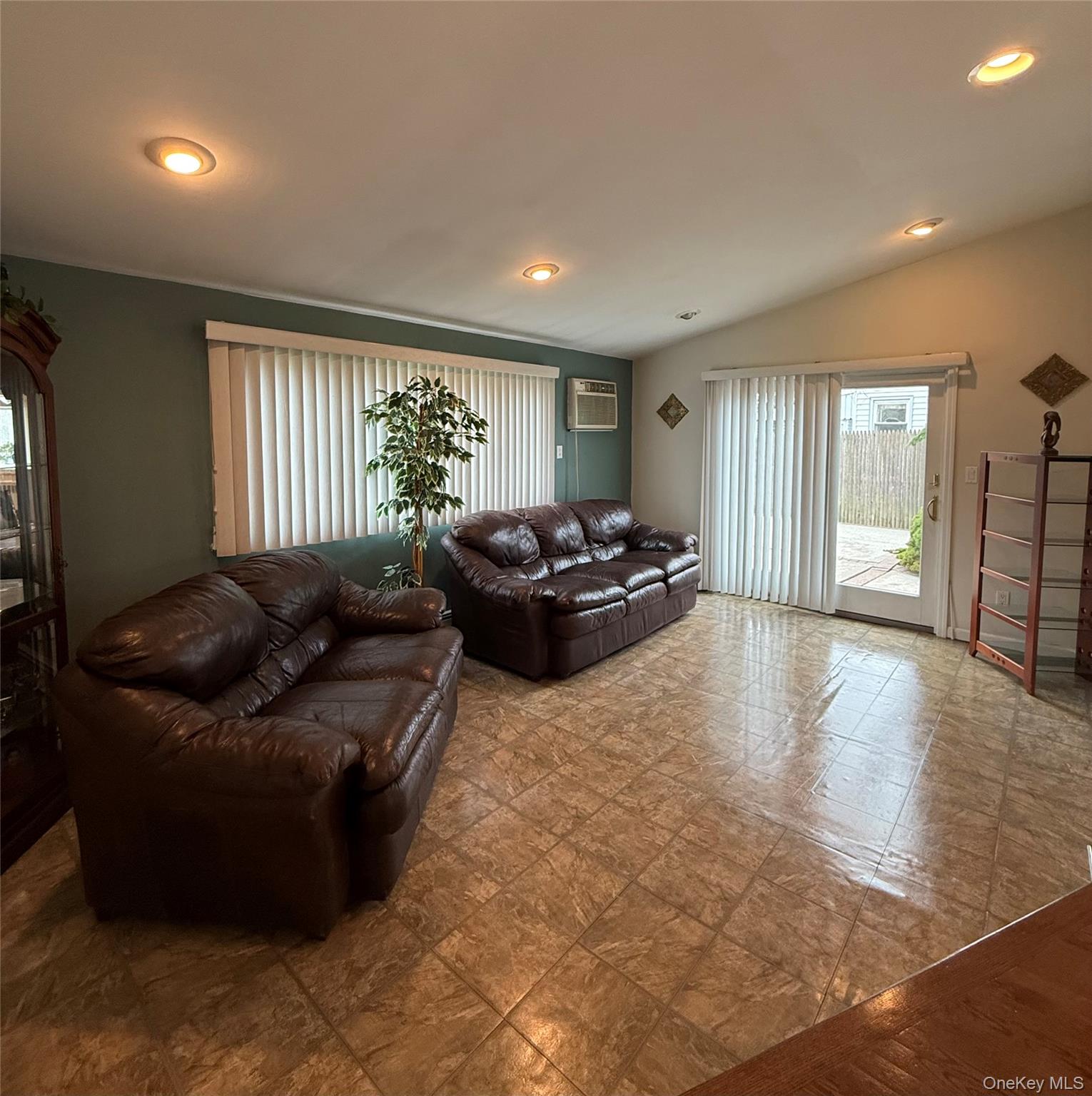 1009 Huckleberry Road North Bellmore, NY 11710 - Photo 5 of 24 a living room with furniture window and wooden floor