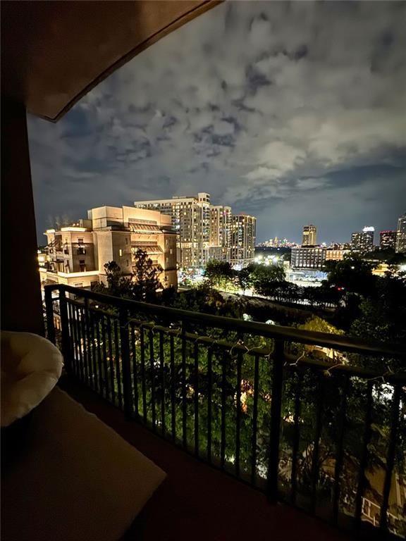 3040 Peachtree Road Northwest, Unit 707 Atlanta, GA 30305 - Photo 2 of 38 a city view from a balcony