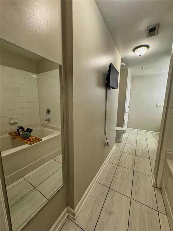 3040 Peachtree Road Northwest, Unit 707 Atlanta, GA 30305 - Photo 22 of 38 a bathroom with a sink and shower