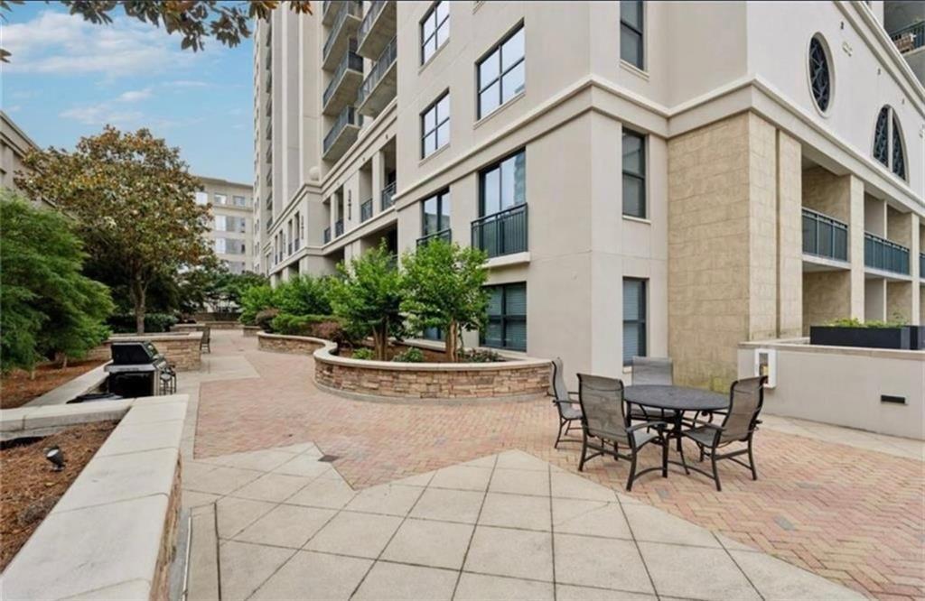 3040 Peachtree Road Northwest, Unit 707 Atlanta, GA 30305 - Photo 29 of 38 a view of a building with sitting area