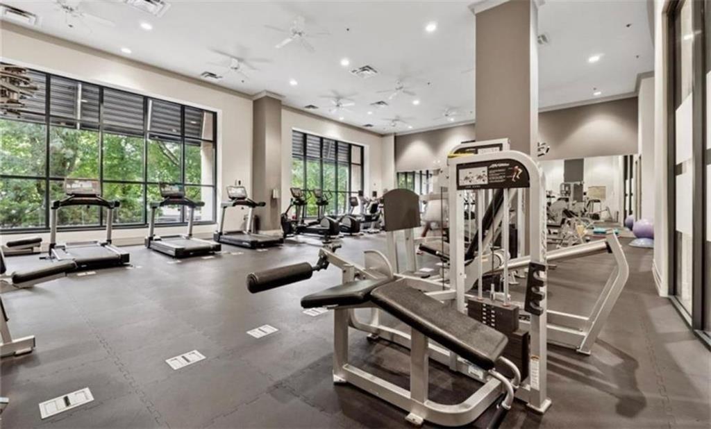 3040 Peachtree Road Northwest, Unit 707 Atlanta, GA 30305 - Photo 34 of 38 a view of a room with gym equipment