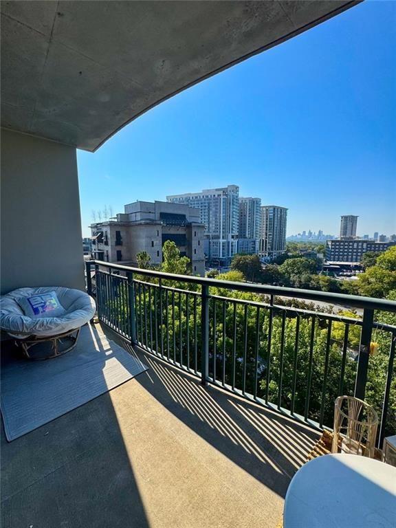 3040 Peachtree Road Northwest, Unit 707 Atlanta, GA 30305 - Photo 4 of 38 a view of balcony with furniture