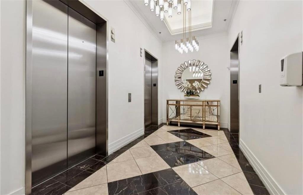 3040 Peachtree Road Northwest, Unit 707 Atlanta, GA 30305 - Photo 5 of 38 a very nice looking bathroom with a mirror