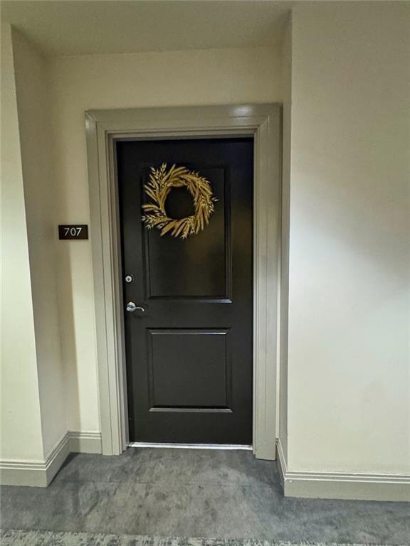 3040 Peachtree Road Northwest, Unit 707 Atlanta, GA 30305 - Photo 6 of 38 a building with a door
